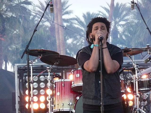 The Weeknd performing in a live show