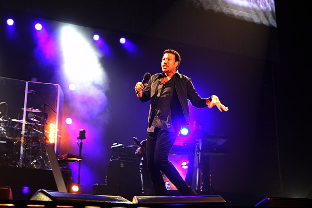 Lionel Richie performing on stage